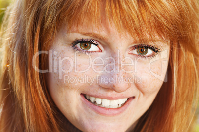 portrait of a beautiful young redhead teenager woman