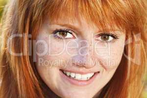 portrait of a beautiful young redhead teenager woman