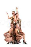 Group of women posing in gold costume