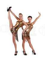 Two sexy women posing in gold go-go costume