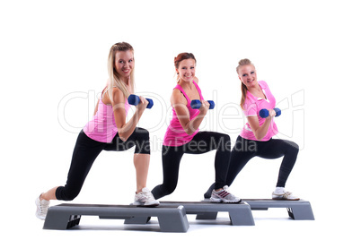 group training instructors with dumbbells