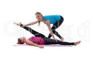 fitness trainer help woman exercise stretch