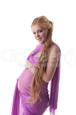 beauty pregnant woman portrait in pink fabric