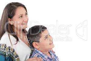 Happy mother with orthodontics and son isolated on light backgro