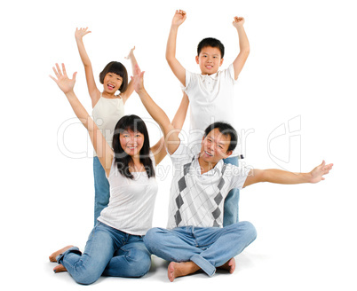 Asian family arms up