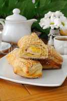 Roll out puff pastry with ham and cheese