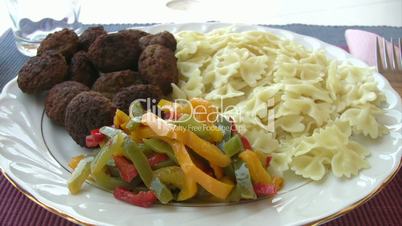 Pasta with meatball and pepper
