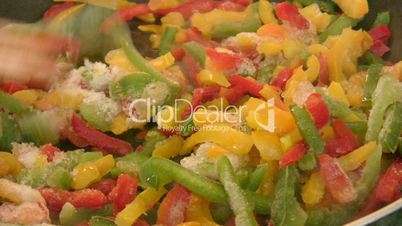 Pepper cooking in saucepan