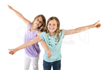 two girls with thumbs up