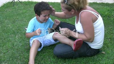 Injured little boy crying