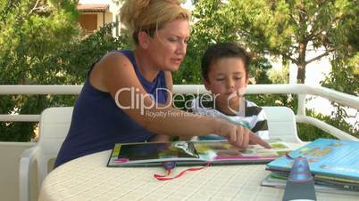 Mother and son reading a book