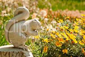 A Cute Stone Chipmunk Statue