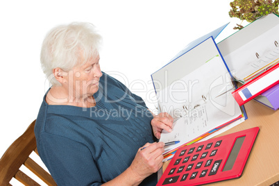 Senior woman doing her accounts