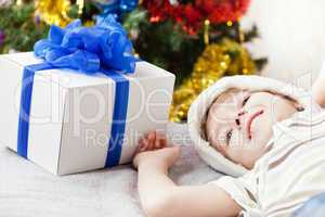 Smiling child boy with new year present or christmas holiday gif
