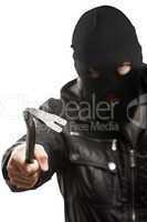 Criminal thief or burglar man in balaclava or mask holding crowb