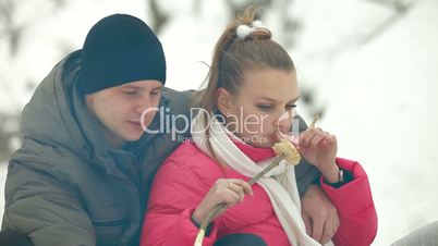 Teenage Couple in Winter Forest