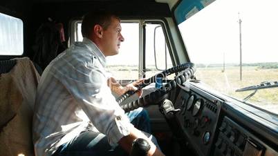 Lorry Driver at the Wheel of Truck