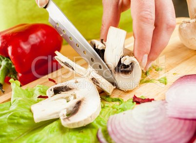 cutting mushroom champignon