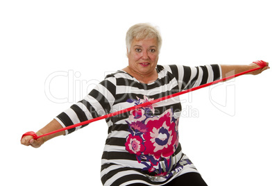 Seniorin mit Stretchband