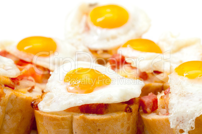 Baguette Slice with Ham and Fried Quail Egg