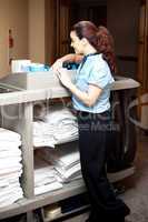Pretty housekeeping executive busy working