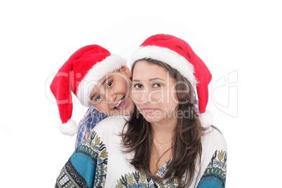 Cheerful boy and woman in Santa Claus hat. Isolated on white bac