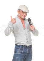 Man in a Cap with a Microphone shows Thumb-up