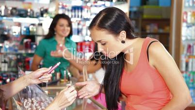 Women Shopping for Makeup Products
