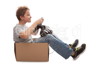 boy-driver of a cardboard box