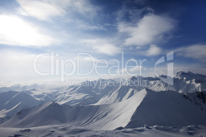 Snowy mountains in evening