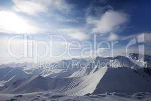 Snowy mountains in evening