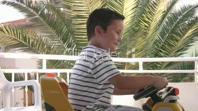 Little Boy driving car