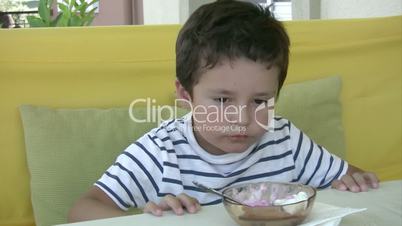 Little boy eating ice cream