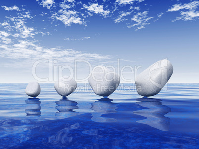 White stones on blue water 2