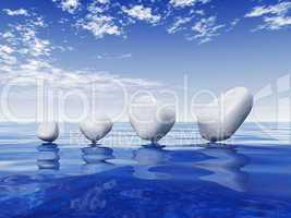 White stones on blue water 2