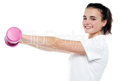 Beautiful young girl working out