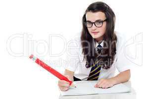Snap shot of calm and relaxed young schoolgirl