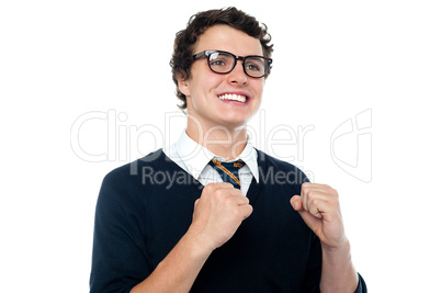 Cheerful youngster celebrating his success