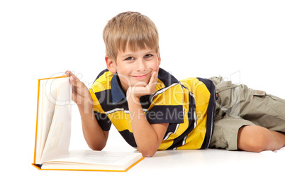 School boy is holding a book