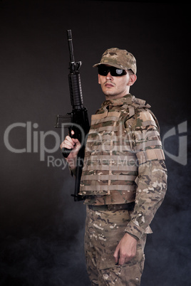 Modern soldier with rifle