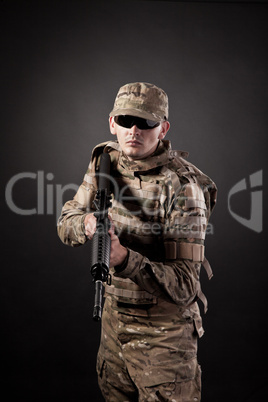 Modern soldier with rifle