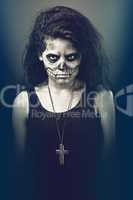 Young woman in day of the dead mask skull. Halloween face art