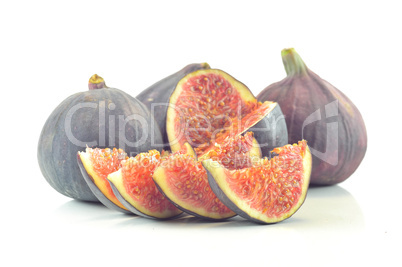 slices of fig on a white background