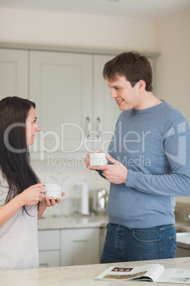 Young couple having a cup of coffee