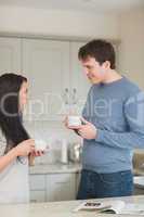 Young couple having a cup of coffee