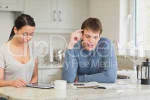 Two people drinking a cup of coffee