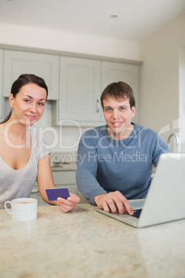 Couple sitting in the kitchen