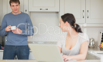 Two people relaxing in the kitchen