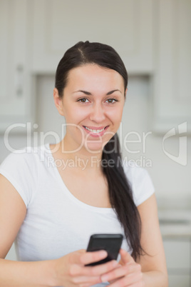 Young woman using the mobile phone