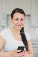 Young woman using the mobile phone